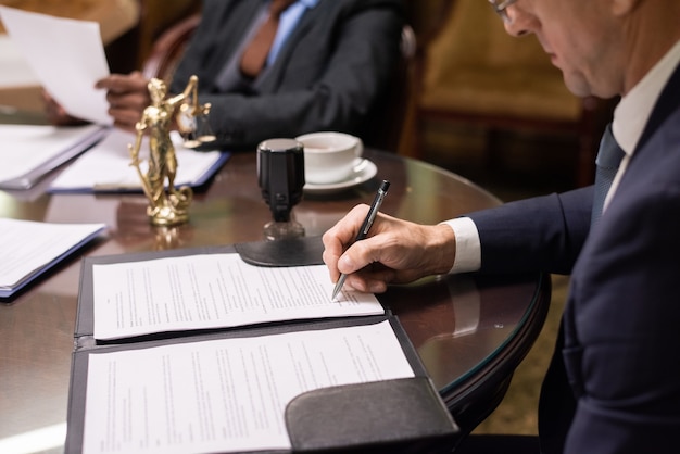Personal Injury Lawyer reviewing client’s case.