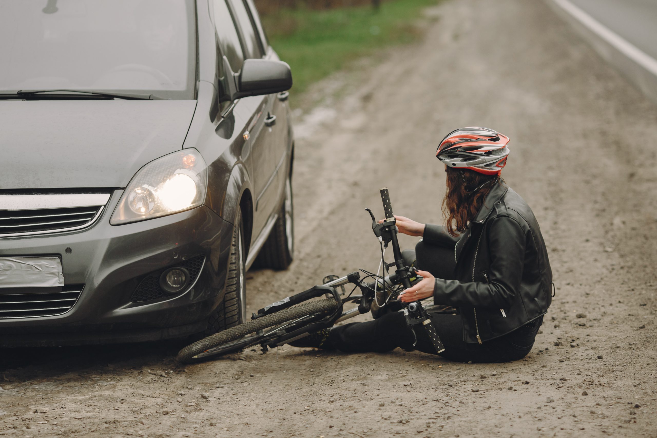 downtown la bicycle accident lawyers - Road accident with cyclist woman driver and car